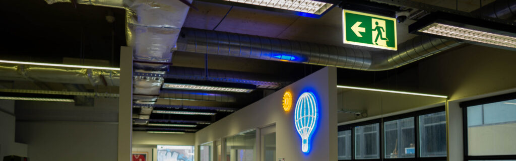 Safety Path Hybrid Exit Sign in Little Lonsdale Street office building